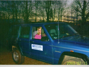 Rural letter carrier Brenda Clemmons driving her RHD Cherokee