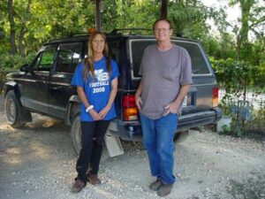 Rural letter carriers Carlyn and TC Speer wtih their RHD Jeep Cherokee postal delivery vehicle