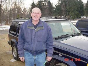 Rural letter carrier Dennis J Malloy and his RHD Jeep Cherokee