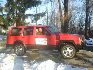 Rural letter carrier Gerald Gnacinski and his RHD Jeep Cherokee