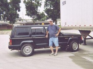 Rural postal worker Greg Honkee with his RHD Cherokee