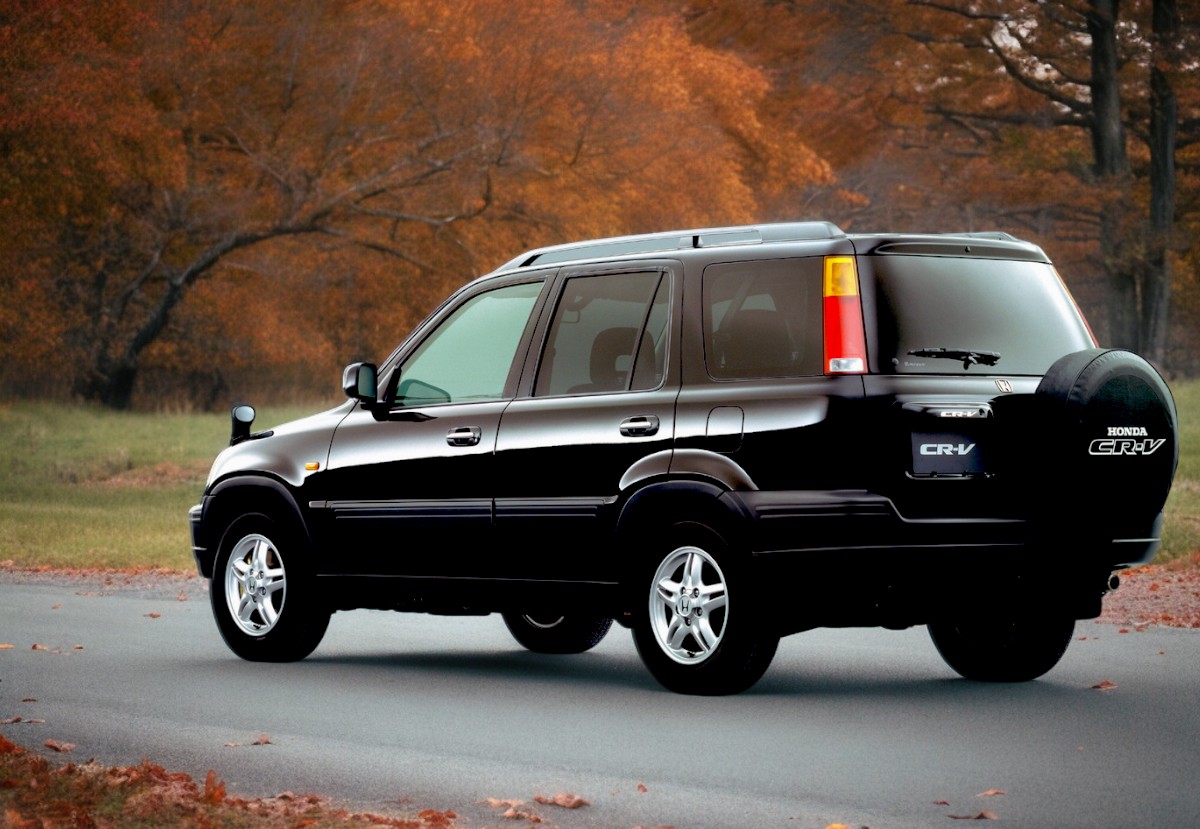 RHD Honda CR-V in black from left rear in fall