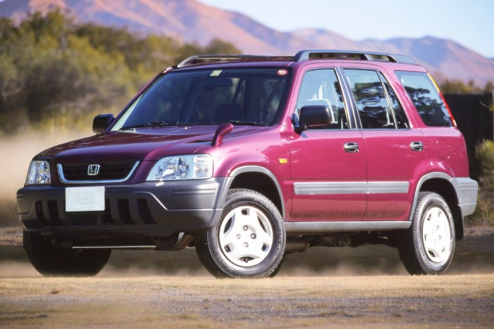 RHD Honda CR-V in red from right front