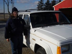 Rural letter carrier Jane Stull with her RHD Cherokee