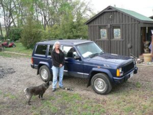 Rural letter carrier, Janet Mitchell, with her RHD Cherokee