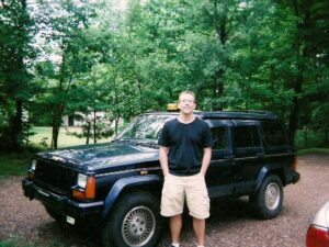 Rural letter carrier Jeff Ontto with his RHD Jeep Cherokee