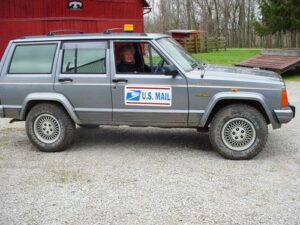 Rural letter carrier Joda Junk and driving their RHD Jeep Cherokee