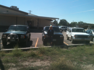 Rural letter carrier Kay Weeldreyer with her 3 RHD Jeep Cherokees