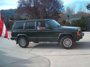 Rural letter carrier Ken Dunbar and his RHD Jeep Cherokee