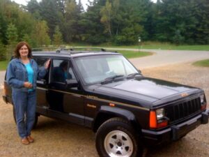 Rural postal carrier Laurie Zygiel with her RHD Cherokee