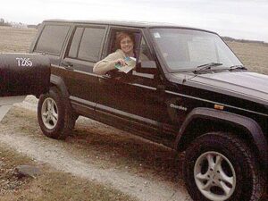 Rural mail carrier Madonna Smyser and her RHD Jeep Cherokee