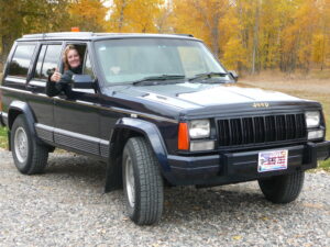 Rural letter carrier Marilyn Moe and her RHD Jeep Cherokee
