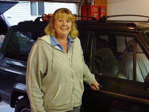 Rural letter carrier Mary Smulski and her RHD Jeep
