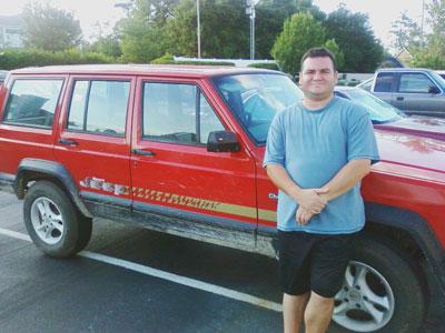Rural letter carrier Ronald Simonetti and his RHD Jeep Cherokee