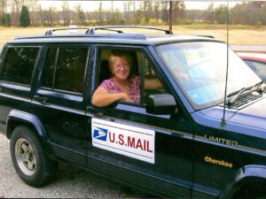 Rural postal worker Sharon Lewis and her RHD Jeep Cherokee