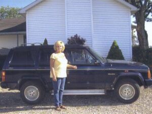 Rural letter carrier Sheila Wentz and her right-hand drive Cherokee