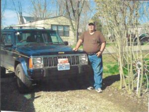 Rural letter carrier Steven M Tallent with his RHD Jeep Cherokee