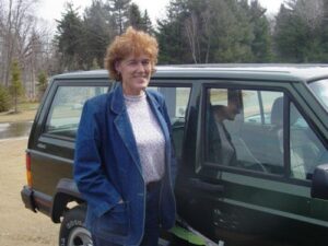Rural letter carrier Susan Weisemann with her RHD Cherokee