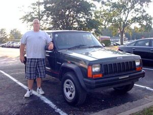 Rural letter carrier Ty Averett and his right-hand drive Jeep Cherokee