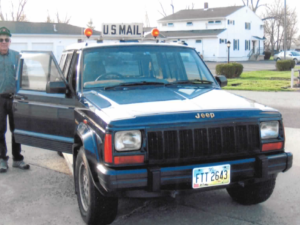 Rural letter carrier Walter Hanefield and his right-hand drive Jeep Cherokee