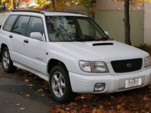 RHD Subaru Forester in white from right front