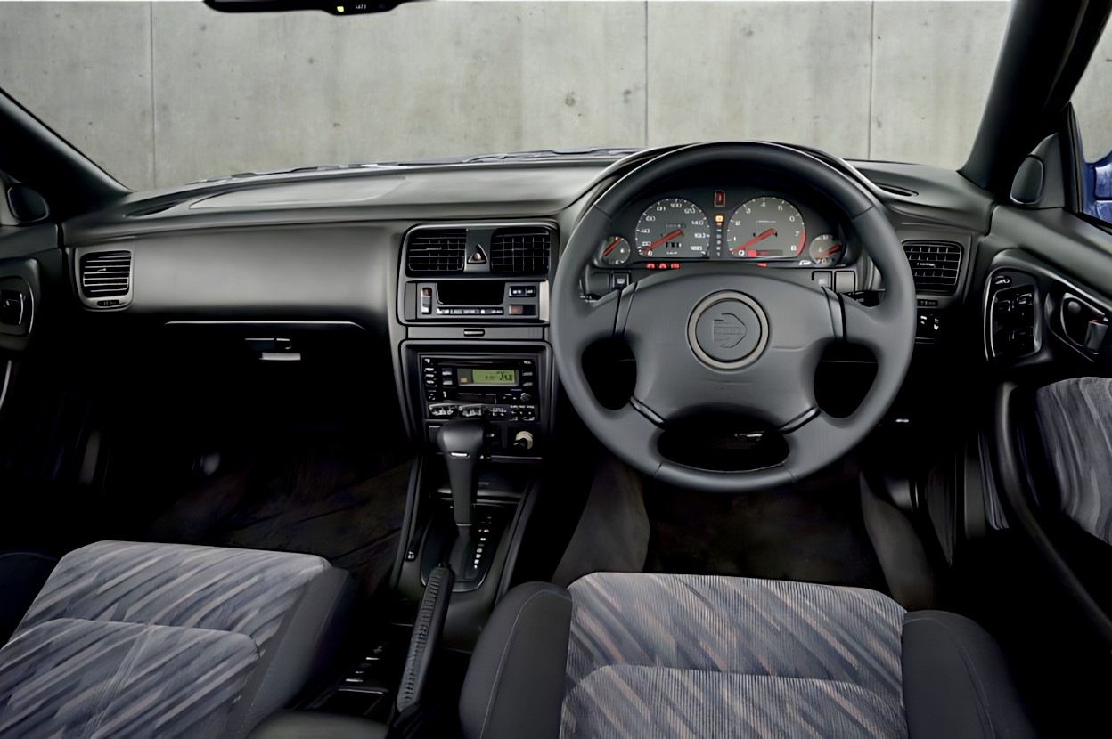 RHD Subaru Legacy Wagon front seats showing driving position and dashboard