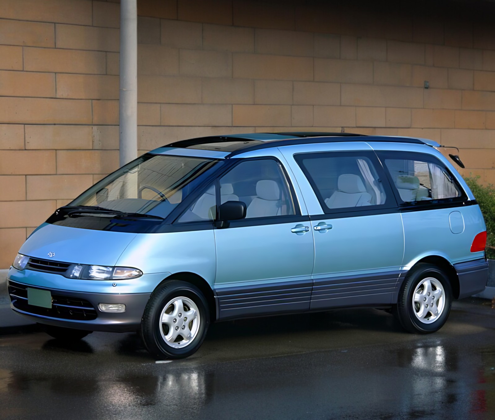 RHD Toyota Estima in metallic blue from left front