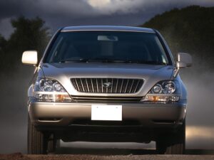 RHD Toyota Harrier (Lexus RX) SUV in champagne silver from front.