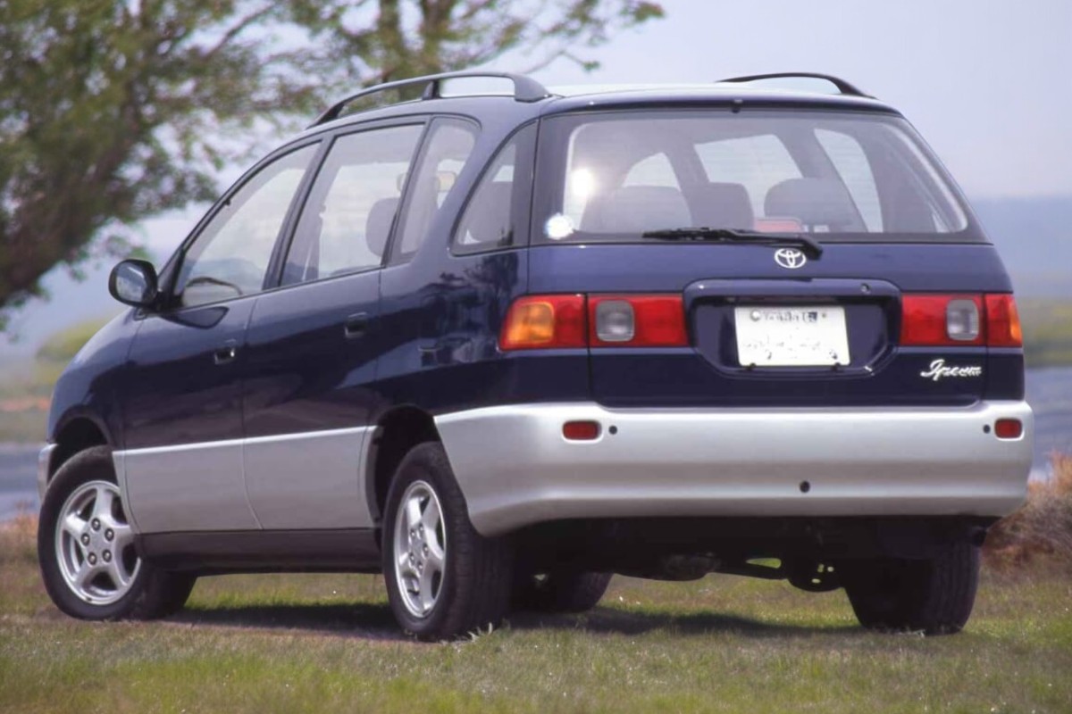 RHD Toyota Ipsum in dark blue from left rear